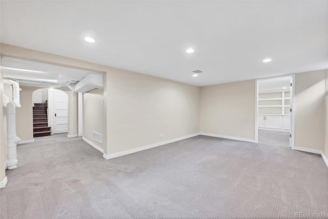 770 Locust, Denver, CO 80220 - finished basement featuring arched walkways, carpet, recessed lighting, baseboards, and stairway