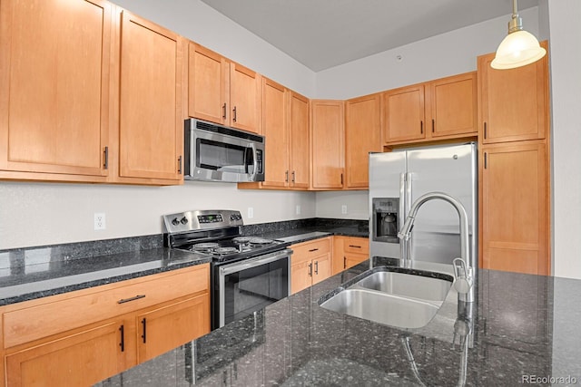 14321 E Tennessee Ave Unit 1-301, Aurora, CO 80012 - kitchen with a sink, stainless steel appliances, decorative light fixtures, and dark stone countertops