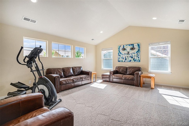 living area with baseboards, visible vents, vaulted ceiling, and light colored carpet