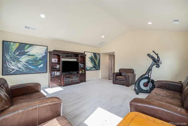 living room with lofted ceiling, visible vents, and light carpet