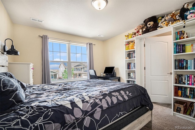 bedroom featuring visible vents