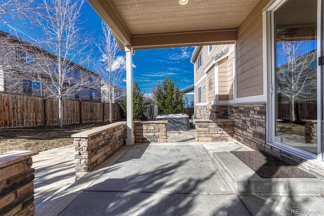 view of patio featuring a fenced backyard