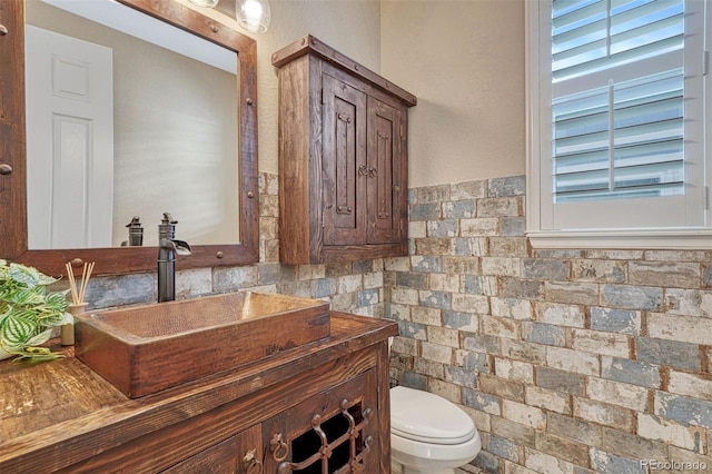 half bath with vanity and toilet