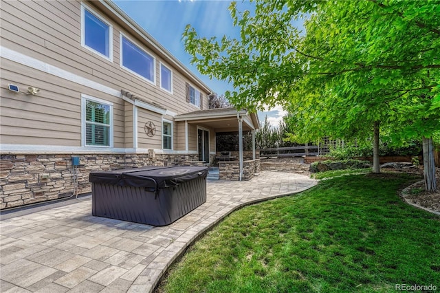 10761 Hillsboro Cir, Parker, CO 80134 - fenced backyard featuring a hot tub and a patio