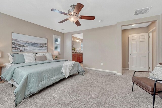 10761 Hillsboro Cir, Parker, CO 80134 - bedroom featuring light colored carpet, ceiling fan, and ensuite bathroom