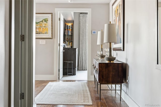 hall featuring wood-type flooring