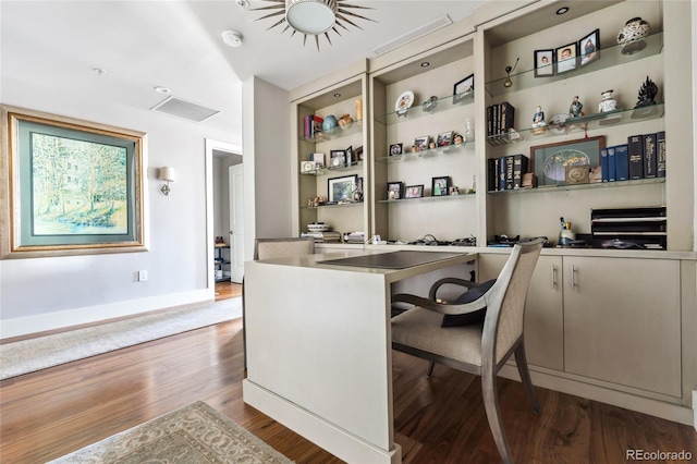 1411 Wynkoop St Unit 806, Denver, CO 80202 - office with wood finished floors, built in desk, and baseboards