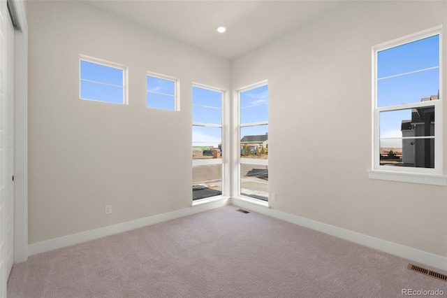 view of carpeted spare room