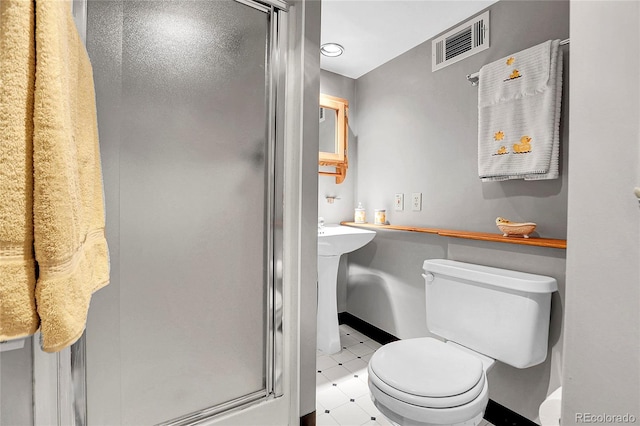 7610 S Garland St, Littleton, CO 80128 - full bathroom with tile patterned floors and a shower stall