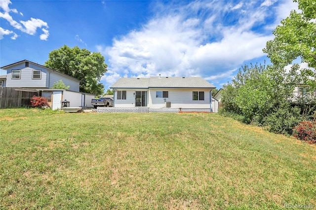 7610 S Garland St, Littleton, CO 80128 - back of property featuring a storage unit