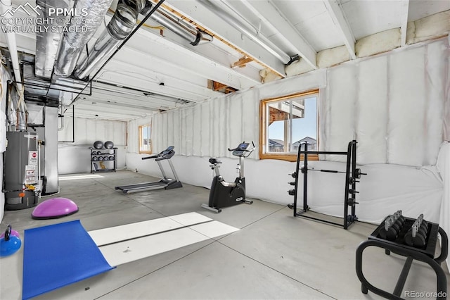 exercise area featuring water heater