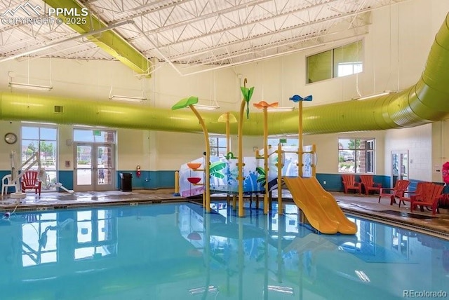community pool with french doors