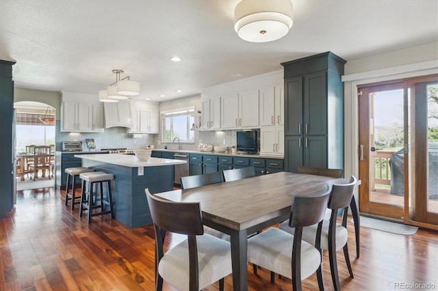 7289 Stroh Rd, Parker, CO 80134 - dining room featuring dark wood finished floors and recessed lighting