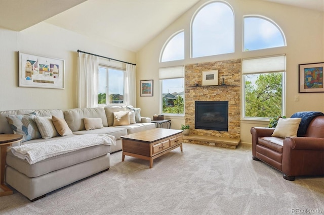 7289 Stroh Rd, Parker, CO 80134 - carpeted living area featuring plenty of natural light, high vaulted ceiling, and a fireplace