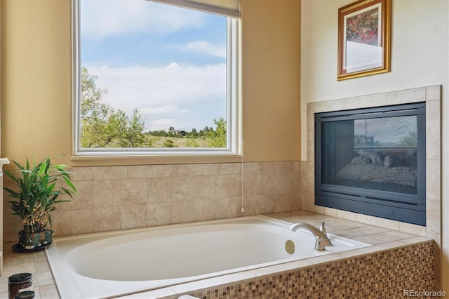 7289 Stroh Rd, Parker, CO 80134 - full bath featuring a garden tub and a fireplace