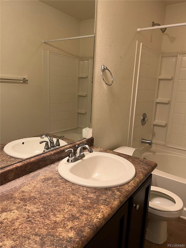 full bathroom featuring tub / shower combination, tile flooring, toilet, and vanity