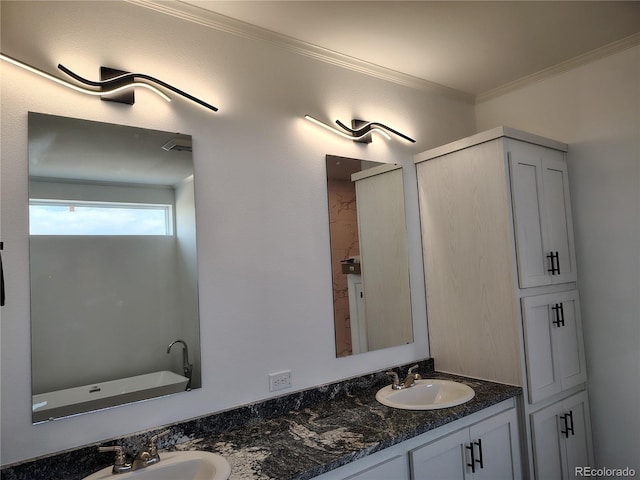 bathroom with vanity and crown molding