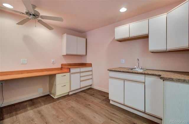 1055 Oak Ridge Rd, Manitou Springs, CO 80829 - kitchen with recessed lighting, a sink, light wood-style flooring, a ceiling fan, and baseboards