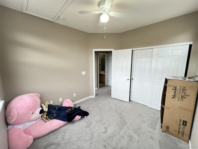 sitting room featuring light carpet