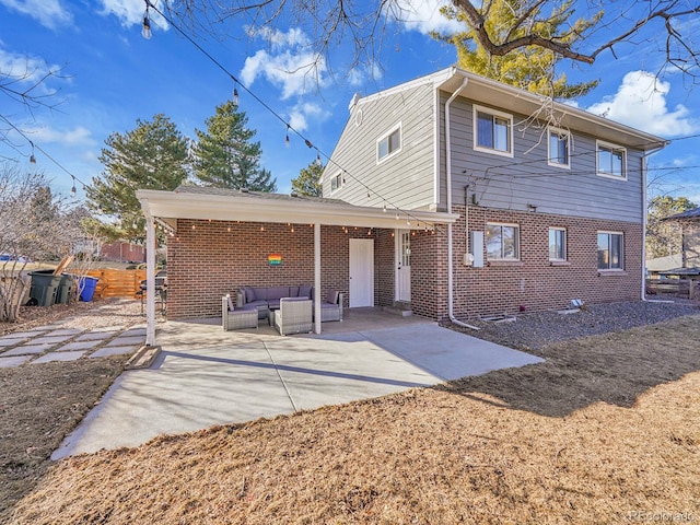 rear view of house featuring an outdoor hangout area and a patio area