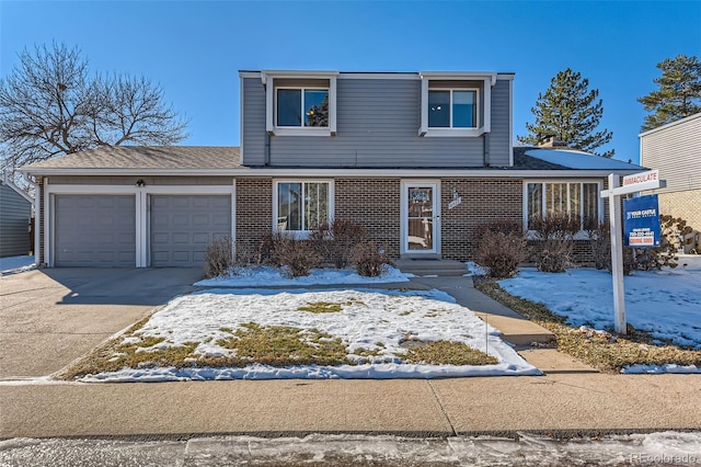 front of property with a garage