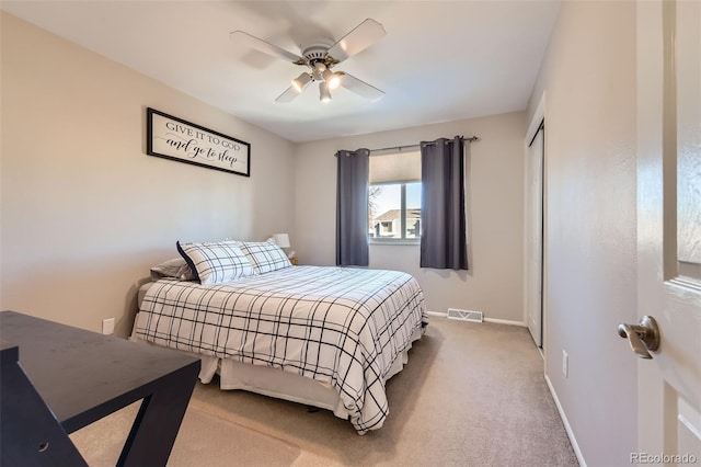 bedroom featuring ceiling fan and carpet flooring