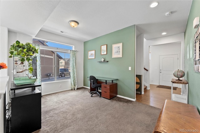 office area featuring recessed lighting, visible vents, baseboards, and carpet flooring