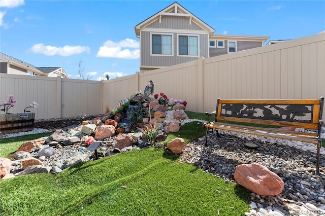view of yard featuring fence