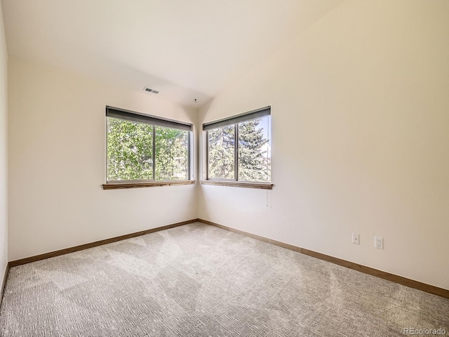 40 Cove Blvd Unit G40, Dillon, CO 80435 - carpeted empty room featuring vaulted ceiling and baseboards