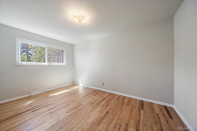 29827 Gigi Rd, Evergreen, CO 80439 - spare room featuring light wood-style floors and baseboards