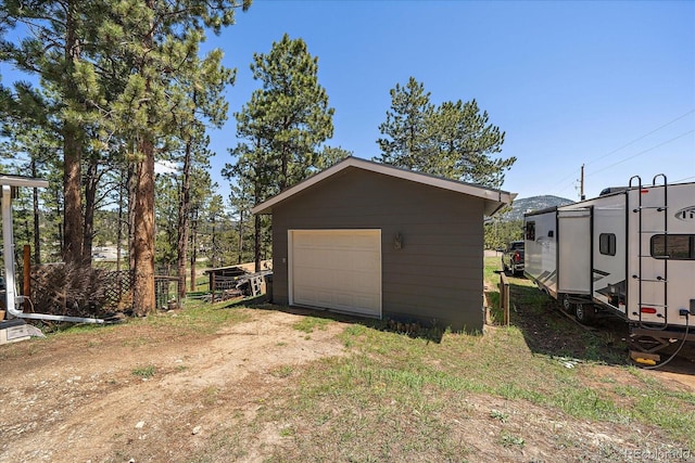 29827 Gigi Rd, Evergreen, CO 80439 - detached garage featuring driveway