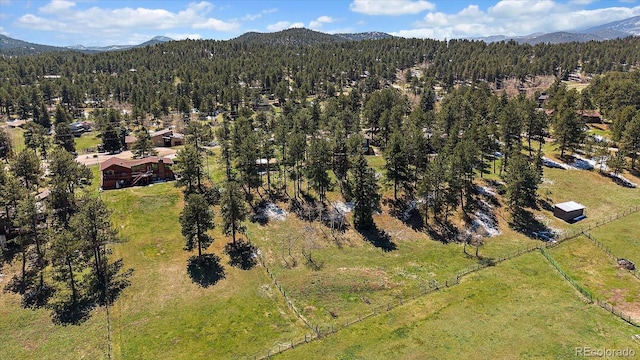 29827 Gigi Rd, Evergreen, CO 80439 - view of property location with a mountainous background and a forest