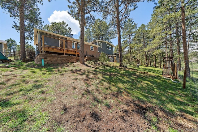 29827 Gigi Rd, Evergreen, CO 80439 - rear view of house with a wooden deck