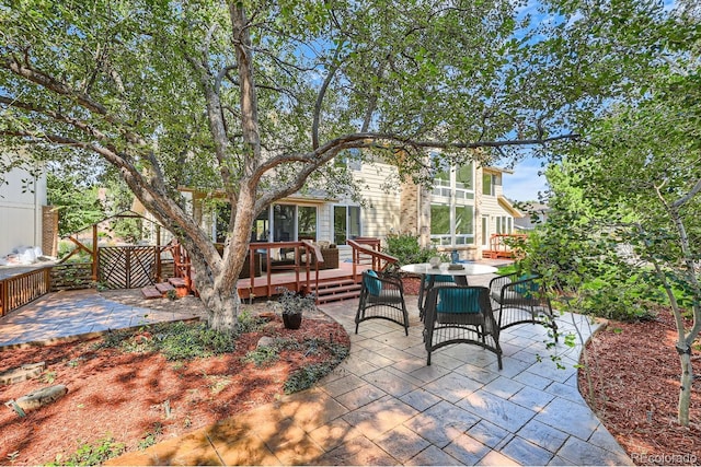 view of patio with a wooden deck