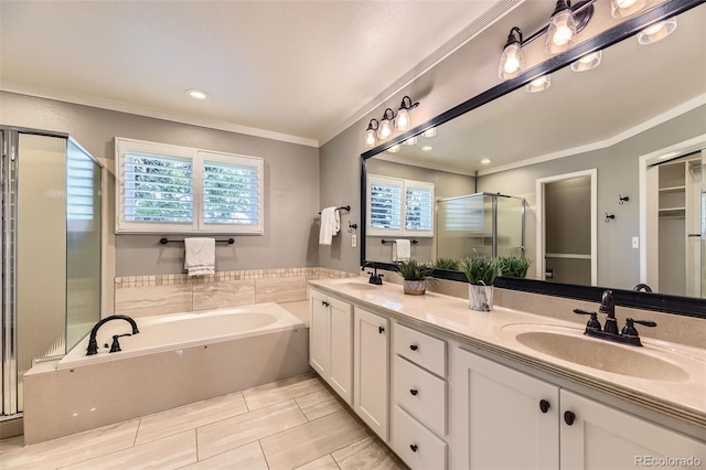 16257 E Belleview Pl, Centennial, CO 80015 - full bathroom featuring a stall shower, double vanity, crown molding, a bath, and recessed lighting