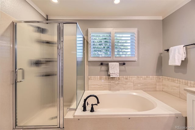 16257 E Belleview Pl, Centennial, CO 80015 - bathroom with a garden tub, a stall shower, crown molding, and recessed lighting