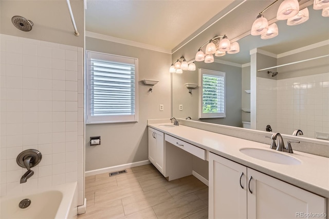 16257 E Belleview Pl, Centennial, CO 80015 - full bathroom with double vanity, shower / tub combination, crown molding, baseboards, and tile patterned floors