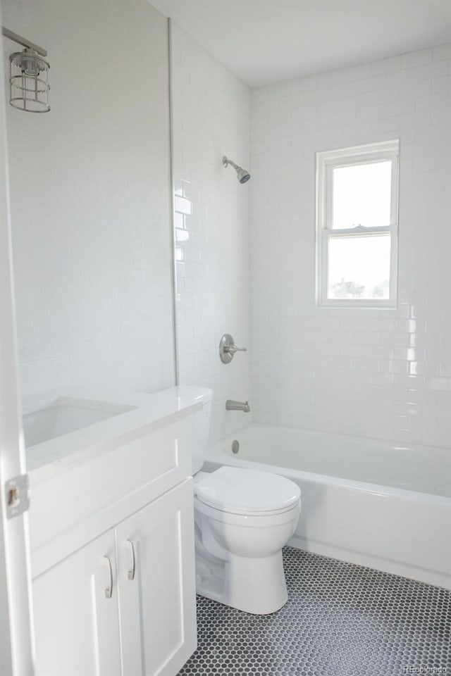 full bathroom featuring vanity, toilet, and shower / bath combination