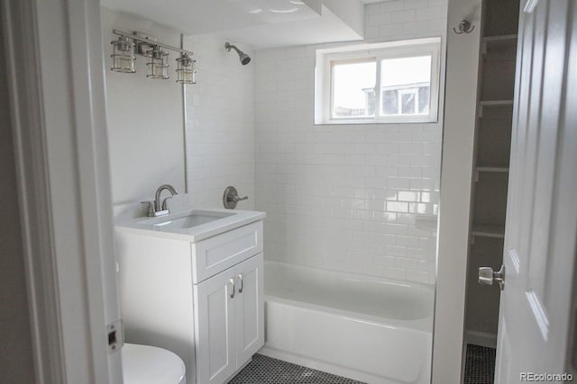 full bath featuring vanity, bathing tub / shower combination, toilet, and tile patterned flooring