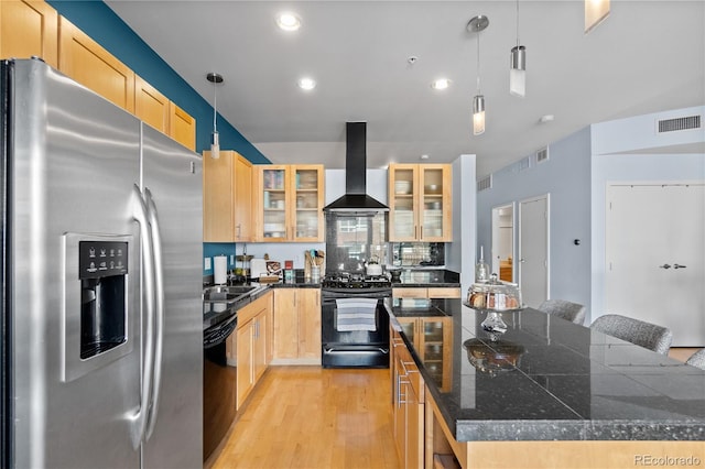 kitchen featuring light wood-style floors, range hood, black appliances, and light brown cabinets