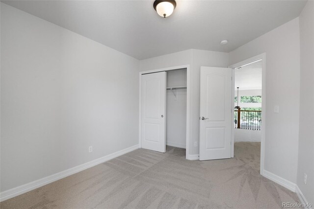 7436 Centennial Glen Dr, Colorado Springs, CO 80919 - unfurnished bedroom with carpet flooring, baseboards, and a closet