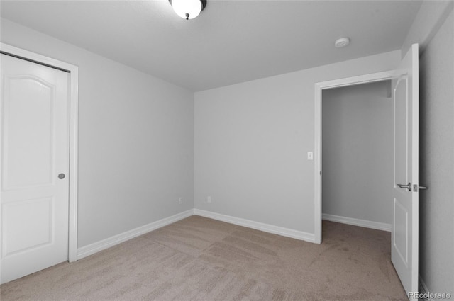 7436 Centennial Glen Dr, Colorado Springs, CO 80919 - unfurnished bedroom with carpet flooring, baseboards, and a closet