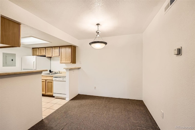 kitchen featuring white appliances, electric panel, light carpet, pendant lighting, and a textured ceiling