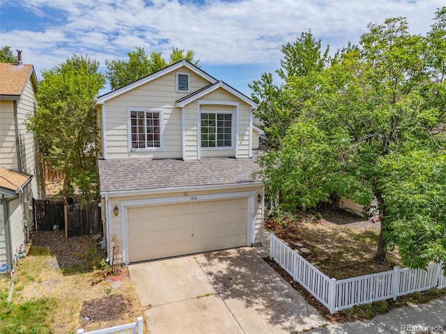 view of front of property featuring a garage