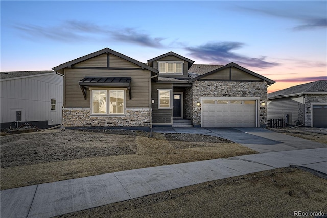 view of front of property with a garage