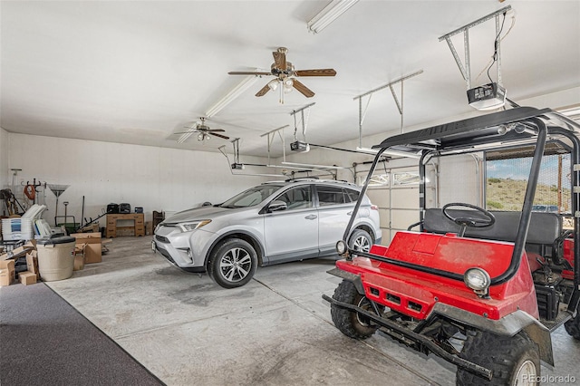 garage with ceiling fan and a garage door opener