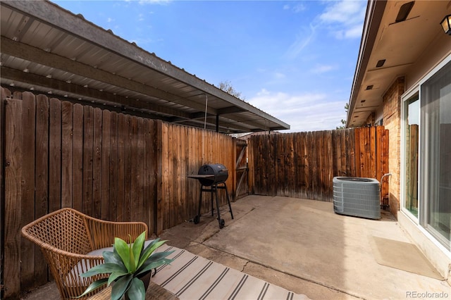wooden terrace featuring central AC, a patio area, area for grilling, and fence