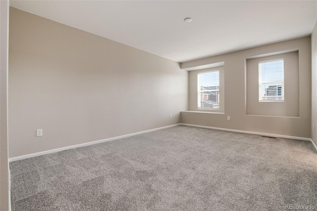 view of carpeted spare room