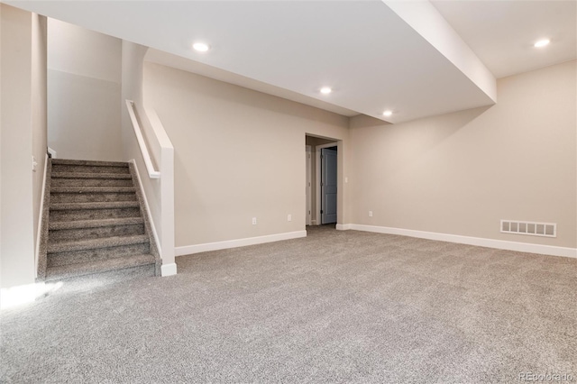 basement with carpet flooring