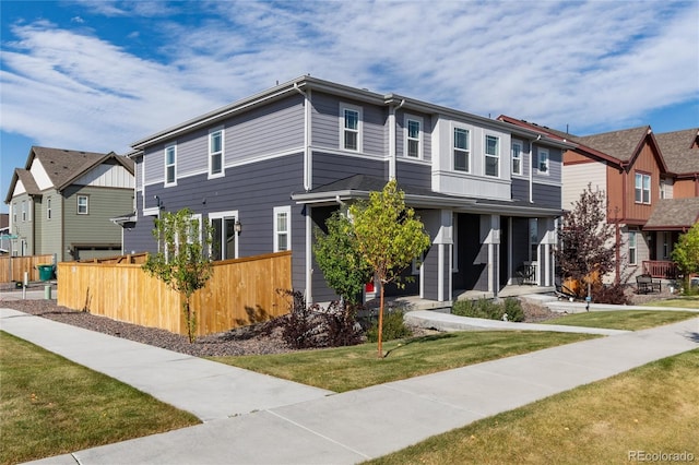 view of front of property with a front lawn